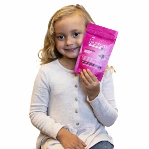 child holding blossom gum bag